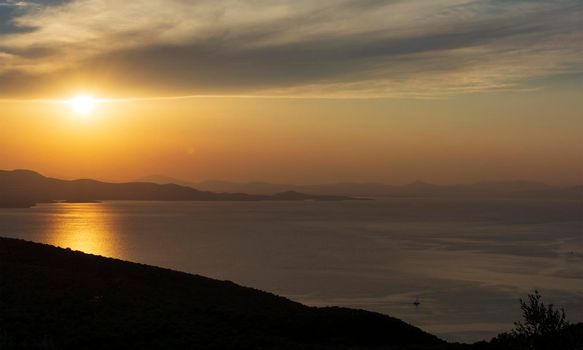 Beautiful sunset over the Aegean Sea in Pelion Peninsula, Greece.