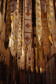 Northern thai religion ceremony flag (Tung) in Phan-Tao temple , Chiangmai Thailand.