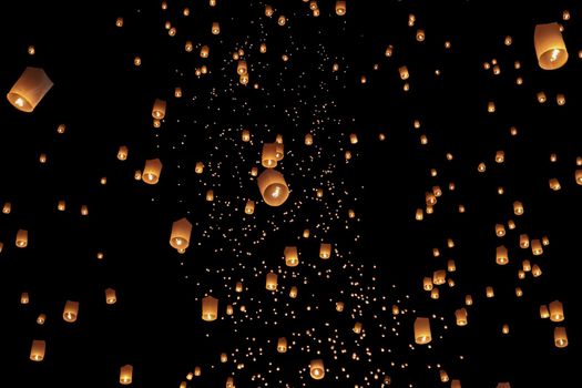 Tourist floating sky lanterns in Loy Krathong festival , Chiang Mai ,Thailand.