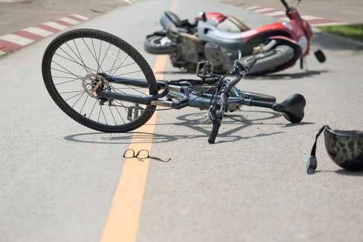 Accident motorcycle crash with bicycle on road