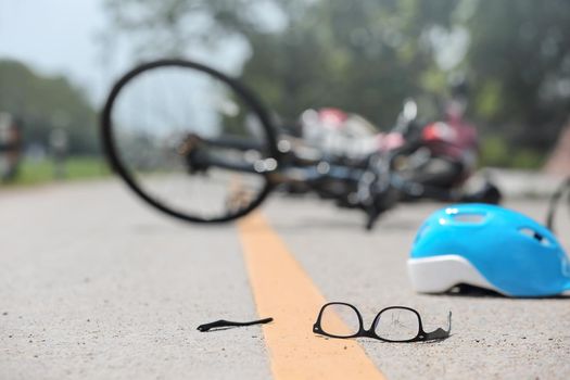 Accident motorcycle crash with bicycle on road
