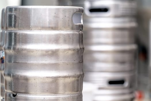 stainless steel beer barrel in the brewery. High quality photo