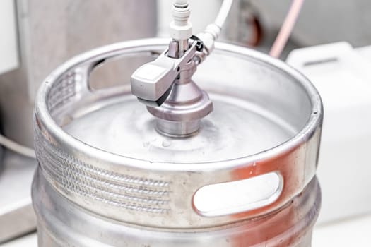 aluminium beer barrel in a brewery. High quality photo