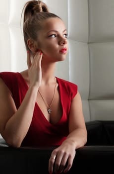 Portrait of pretty young woman in club
