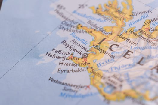 Close up of a colorful map focusing on Reykjavik, Iceland through selective focus, background blur. High quality photo