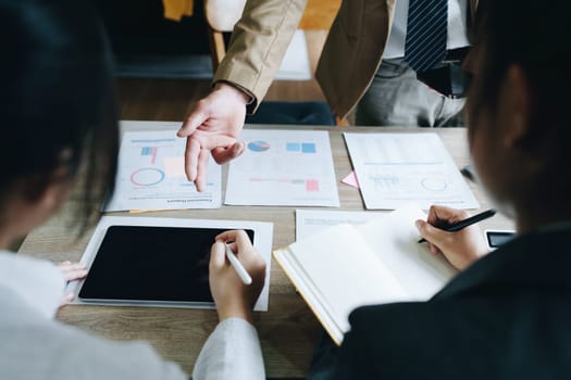 Asian entrepreneurs and business people meeting in a conference room in business planning, financial budget and investment risk assessment to analyze customer groups to increase company growth.