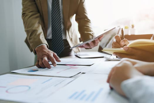 Asian entrepreneurs and business people meeting in a conference room in business planning, financial budget and investment risk assessment to analyze customer groups to increase company growth.