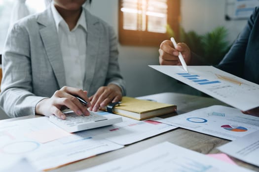 Asian entrepreneurs and business people meeting in a conference room in business planning, financial budget and investment risk assessment to analyze customer groups to increase company growth.