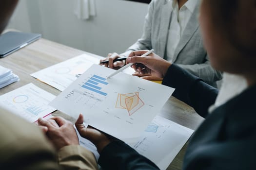 Asian entrepreneurs and business people meeting in a conference room in business planning, financial budget and investment risk assessment to analyze customer groups to increase company growth.