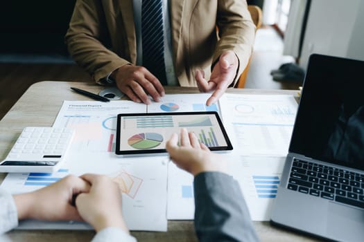 Asian entrepreneurs and business people meeting in a conference room in business planning, financial budget and investment risk assessment to analyze customer groups to increase company growth.