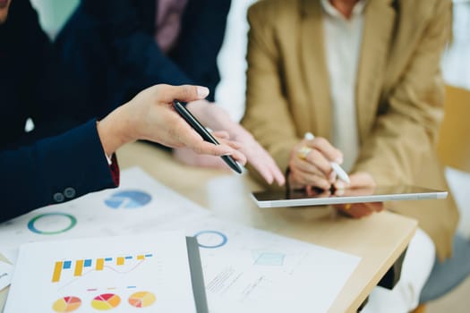 Asian entrepreneurs and business people meeting in a conference room in business planning, financial budget and investment risk assessment to analyze customer groups to increase company growth.