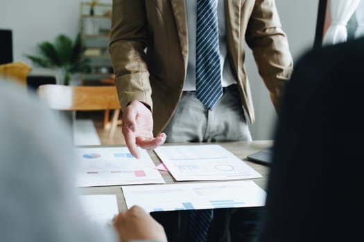 Asian entrepreneurs and business people meeting in a conference room in business planning, financial budget and investment risk assessment to analyze customer groups to increase company growth.