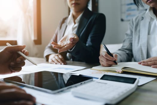 Asian entrepreneurs and business people meeting in a conference room in business planning, financial budget and investment risk assessment to analyze customer groups to increase company growth.