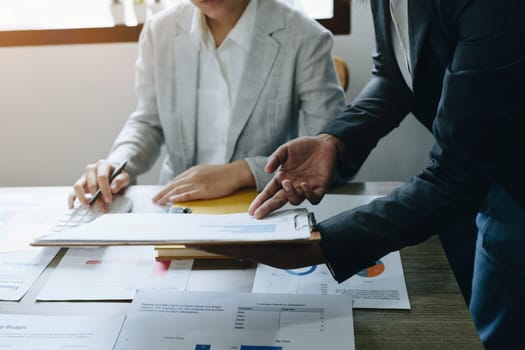 Asian entrepreneurs and business people meeting in a conference room in business planning, financial budget and investment risk assessment to analyze customer groups to increase company growth.