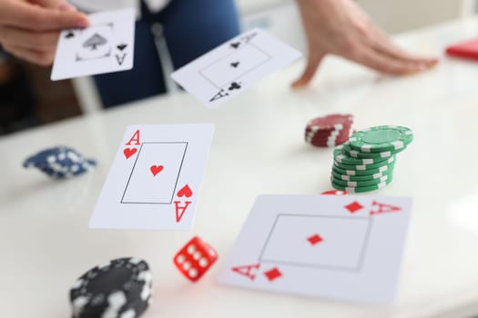Poker cards aces are thrown in online casino. Playing poker and financial earnings