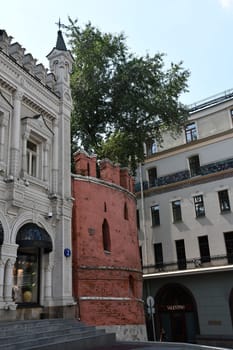 Vertical shot of an old fortress with trees on the roof in Moscow Old Town, Russia