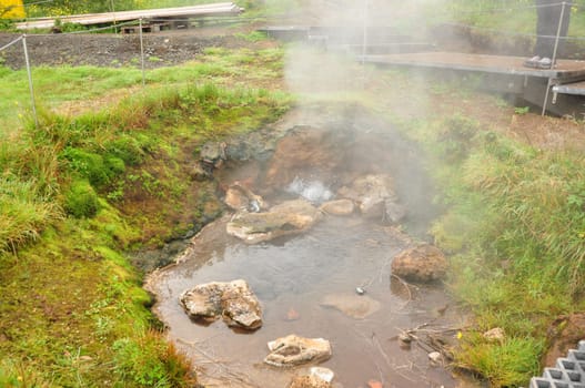 Boiling water in the hot springs near the Strokkur geyser in Iceland