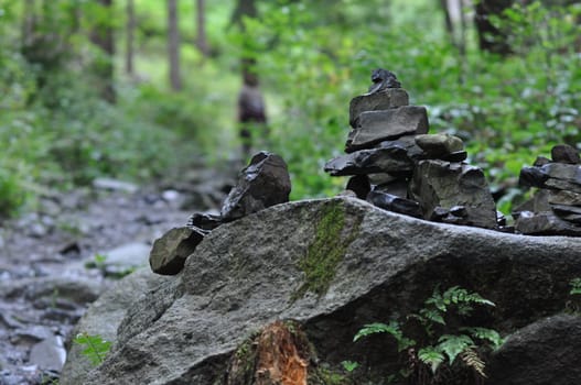 Closeup shot of quarry stones stacked in balance in the Oker valley in the Harz mountains in Germany