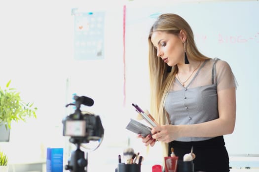 Woman makeup artist conducts online makeup training. Distance learning blogger cosmetologist