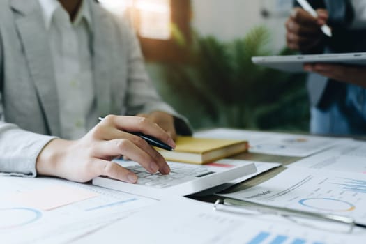 Asian entrepreneurs and business people meeting in a conference room in business planning, financial budget and investment risk assessment to analyze customer groups to increase company growth.