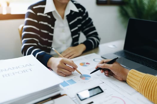 Asian entrepreneurs and business people meeting in a conference room in business planning, financial budget and investment risk assessment to analyze customer groups to increase company growth.