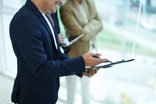 Asian entrepreneurs and business people meeting in a conference room in business planning, financial budget and investment risk assessment to analyze customer groups to increase company growth.