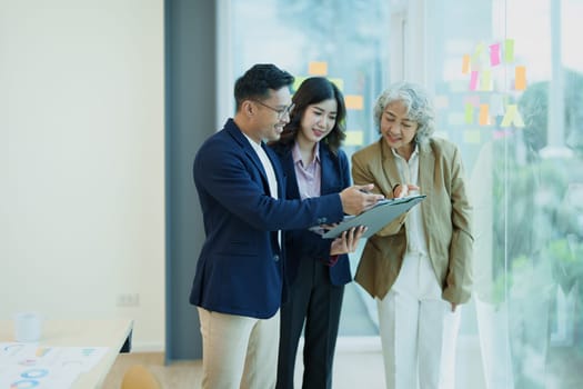 Asian entrepreneurs and business people meeting in a conference room in business planning, financial budget and investment risk assessment to analyze customer groups to increase company growth.