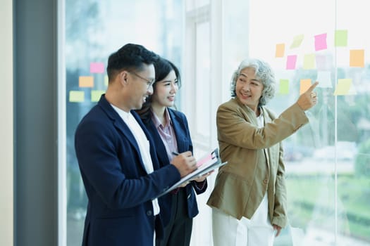 Asian entrepreneurs and business people meeting in a conference room in business planning, financial budget and investment risk assessment to analyze customer groups to increase company growth.