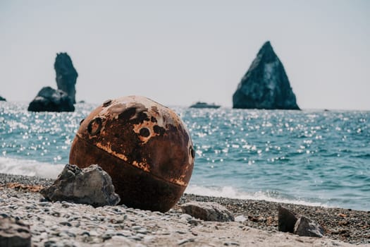 Old sea mine on the beach.