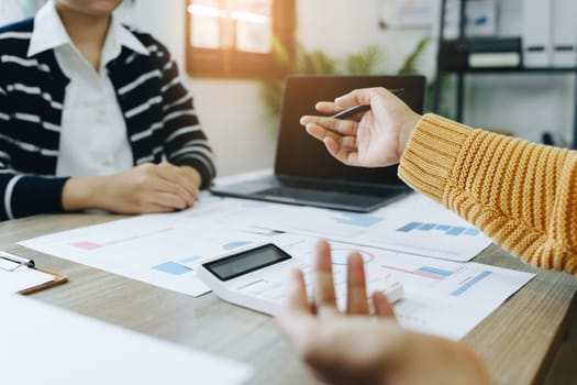 Asian entrepreneurs and business people meeting in a conference room in business planning, financial budget and investment risk assessment to analyze customer groups to increase company growth.