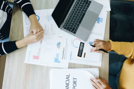 Asian entrepreneurs and business people meeting in a conference room in business planning, financial budget and investment risk assessment to analyze customer groups to increase company growth.