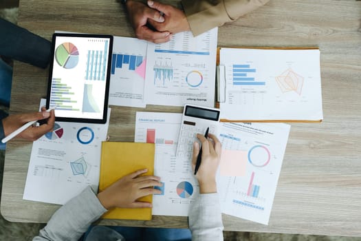 Asian entrepreneurs and business people meeting in a conference room in business planning, financial budget and investment risk assessment to analyze customer groups to increase company growth.