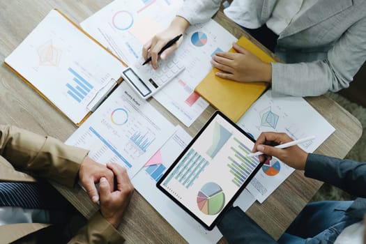 Asian entrepreneurs and business people meeting in a conference room in business planning, financial budget and investment risk assessment to analyze customer groups to increase company growth.