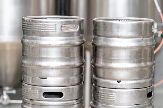 stainless steel beer barrel in the brewery. High quality photo