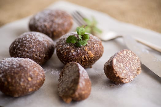 chocolate sweet cakes made from pureed cookies with additives, on baking paper.