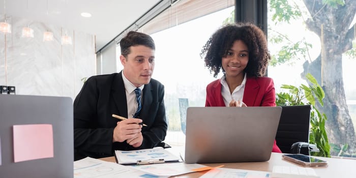 Business financial, accountant discussing with partner are meeting to audit finance planning sales to meet targets set in next year. stock market concept....