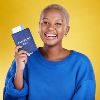 Happy woman face with passport isolated on yellow background for USA travel opportunity, immigration or holiday. Identity documents, flight ticket and excited portrait of young black person in studio.