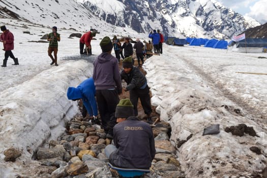 Rudarprayag, Uttarakhand, India, May 05 2014, Kedarnath Project, laborer reconstructing pathway for pilgrims. In June 2013, a multi-day cloudburst centered on the North Indian state of Uttarakhand caused devastating floods and landslides.