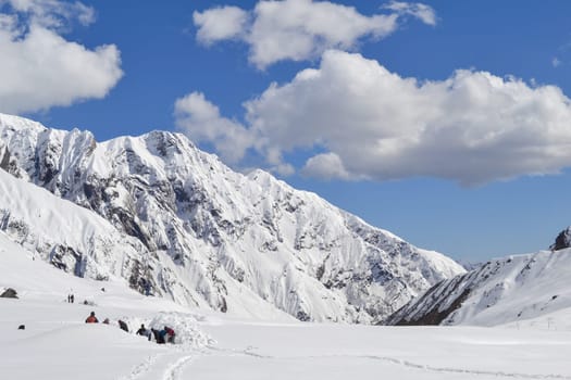 Rudarprayag, Uttarakhand, India, April 26 2014, laborer opening the snow-covered Kedarnath temple route. Kedarnath is a town in the Indian state of Uttarakhand and has gained importance because of Kedarnath Temple.