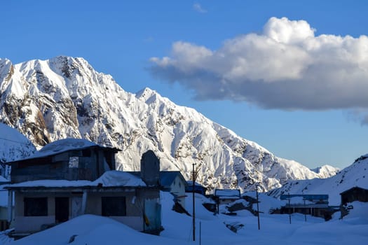 Snow-covered mountain peaks in Himalaya India. The Great Himalayas or Greater Himalayas probably is the highest mountain range of the Himalayan Range System.