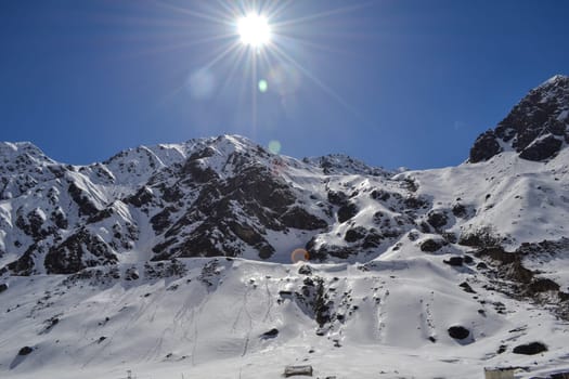 Snow-covered mountain peaks in Himalaya India. The Great Himalayas or Greater Himalayas probably is the highest mountain range of the Himalayan Range System.