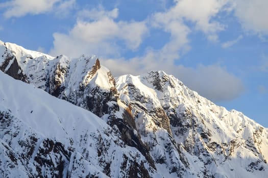 Snow-covered mountain peaks in Himalaya India. The Great Himalayas or Greater Himalayas probably is the highest mountain range of the Himalayan Range System.