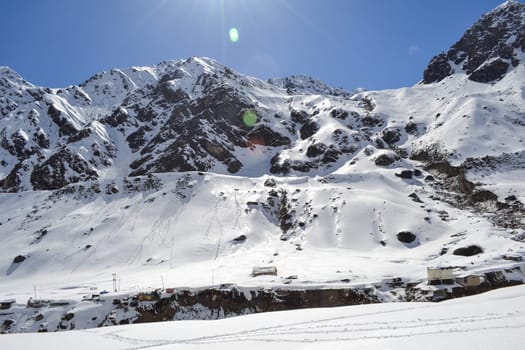 Snow-covered mountain peaks in Himalaya India. The Great Himalayas or Greater Himalayas probably is the highest mountain range of the Himalayan Range System.