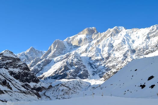Snow-covered mountain peaks in Himalaya India. The Great Himalayas or Greater Himalayas probably is the highest mountain range of the Himalayan Range System.