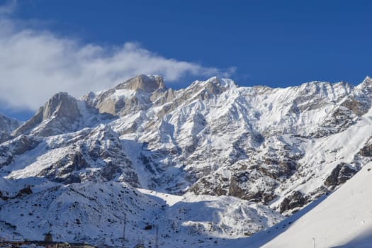 Snow-covered mountain peaks in Himalaya India. The Great Himalayas or Greater Himalayas probably is the highest mountain range of the Himalayan Range System.