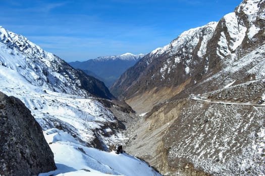 Snow-covered Kedarnath valley in Upper Himalaya India. Kedarnath temple is located in Uttarakhand, India. the temple is open only between the months of April to November.