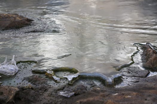 Frozen water of the rivers in the Himalayan India.. Freezing is a phase transition where a liquid turns into a solid when its temperature is lowered below its freezing point.