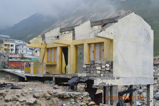 Damaged buildings in Kedarnath disaster June 2013. In June 2013, a multi-day cloudburst centered on the North Indian state of Uttarakhand caused devastating floods and landslides. High quality photo