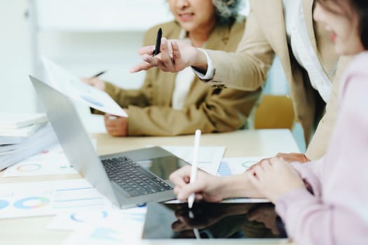 Asian entrepreneurs and business people meeting in a conference room in business planning, financial budget and investment risk assessment to analyze customer groups to increase company growth.