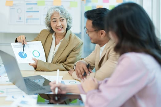 Asian entrepreneurs and business people meeting in a conference room in business planning, financial budget and investment risk assessment to analyze customer groups to increase company growth.